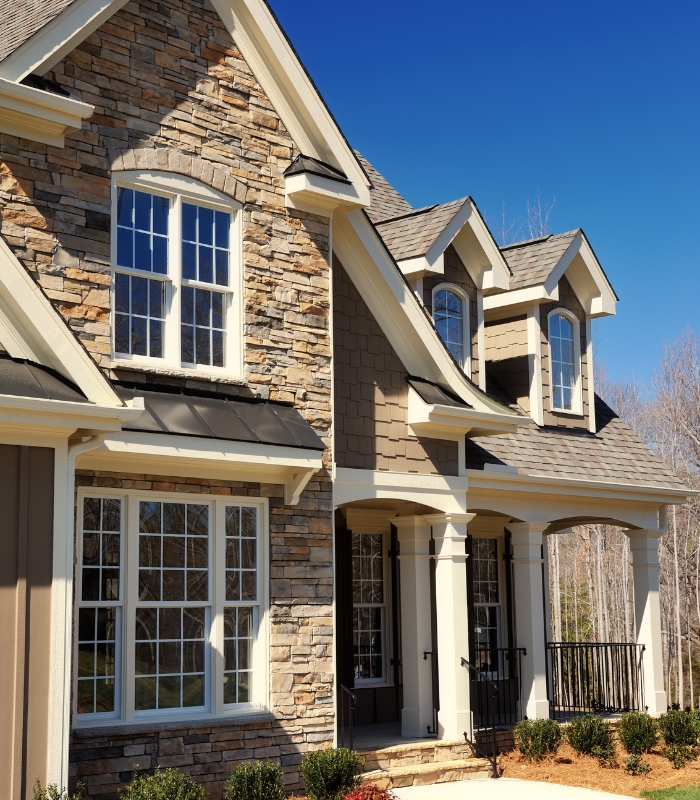 Home for sale in the Central Valley with for sale sign and real estate agent support